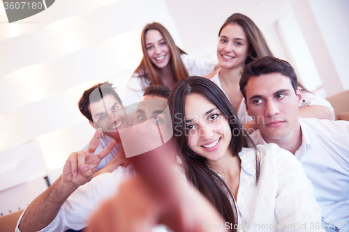 Image of group of friends taking selfie