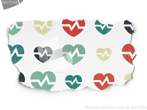 Image of Healthcare concept: Heart icons on Torn Paper background
