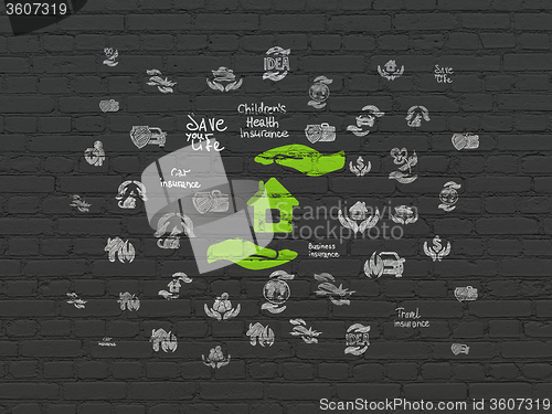 Image of Insurance concept: House And Palm on wall background
