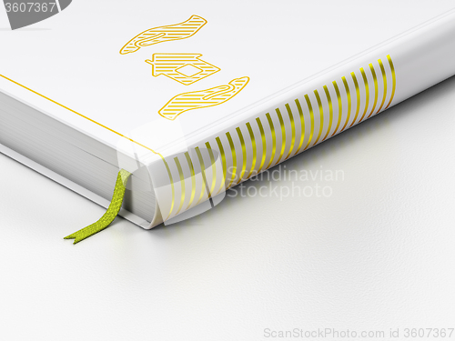 Image of Insurance concept: closed book, House And Palm on white background