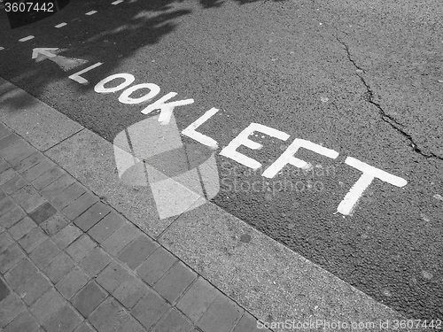 Image of Black and white Look Left sign