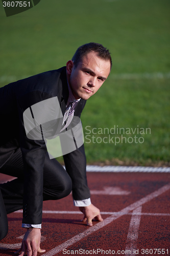 Image of business man ready to sprint