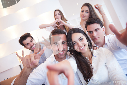 Image of group of friends taking selfie