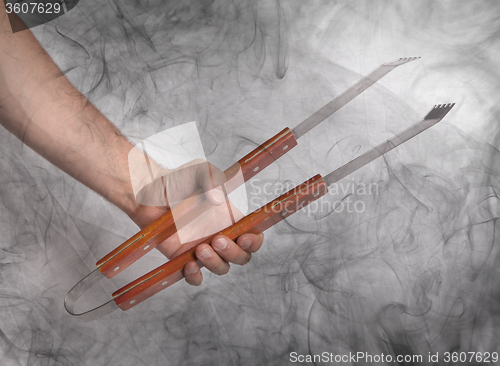 Image of Hand hold of BBQ equipment