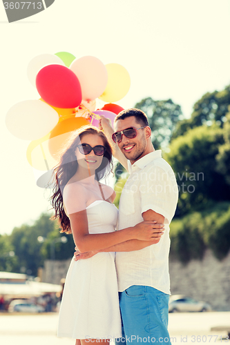 Image of smiling couple in city