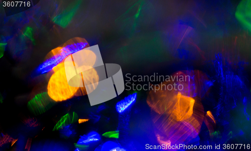 Image of colorful night lights bokeh over dark background