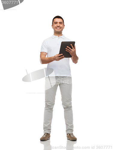 Image of smiling man with tablet pc computer