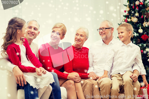 Image of smiling family at home