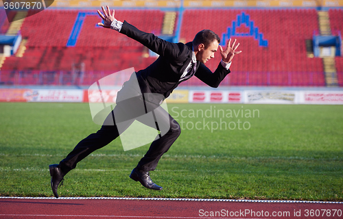 Image of business man ready to sprint