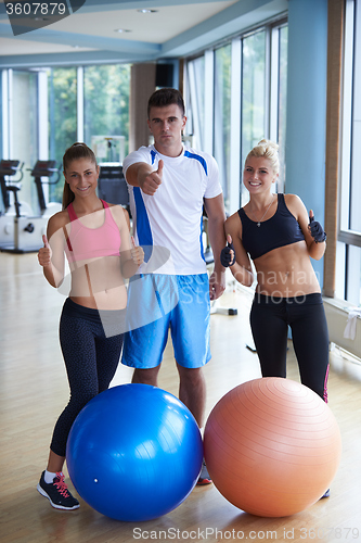 Image of people group in fitness gym