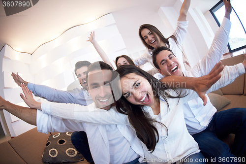 Image of group of friends taking selfie