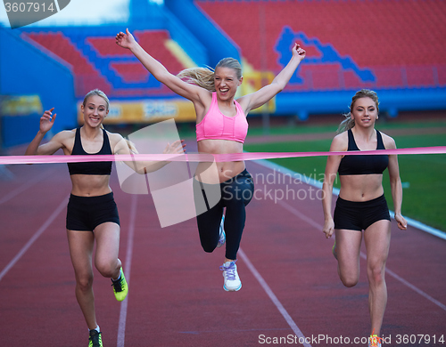 Image of Female Runners Finishing Race Together