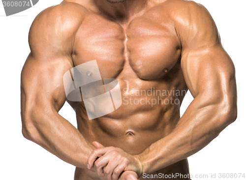 Image of Attractive male body builder on white background