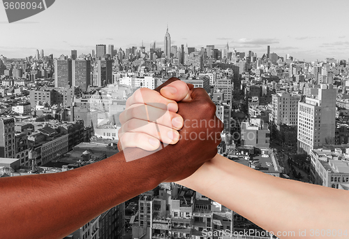 Image of Business Handshake against  Manhattan skyscrapers