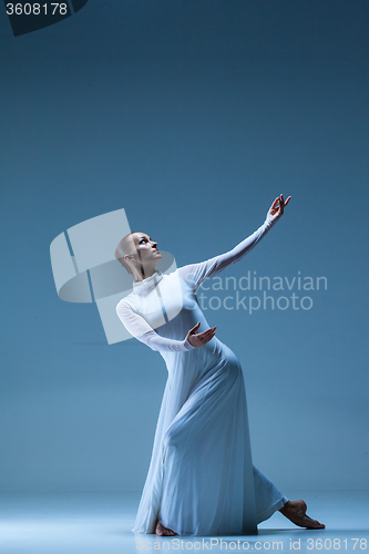 Image of Portrait of the ballerina on blue background