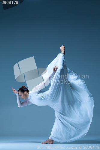 Image of Portrait of the ballerina on blue background