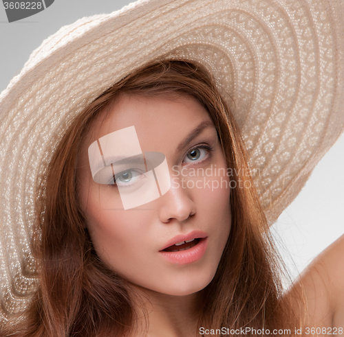 Image of Beautiful girl with broad-brim