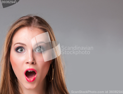 Image of Close-up portrait of surprised beautiful girl