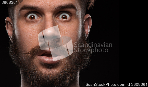 Image of Close-up portrait of amazed guy 