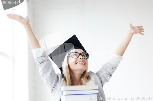 Image of happy student in graduation cap