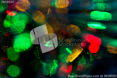 Image of colorful night lights bokeh over dark background