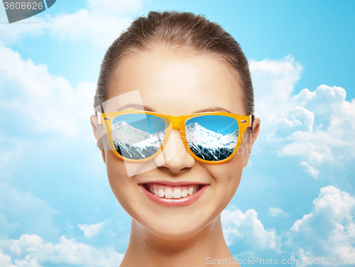 Image of happy face of teenage girl in sunglasses