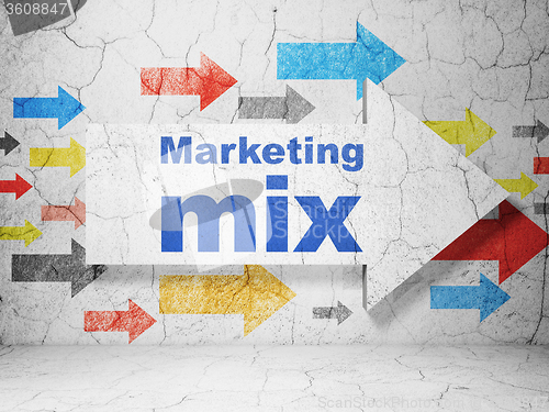 Image of Advertising concept: arrow with Marketing Mix on grunge wall background