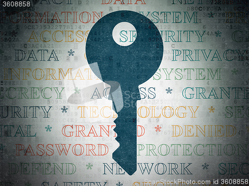 Image of Security concept: Key on Digital Paper background