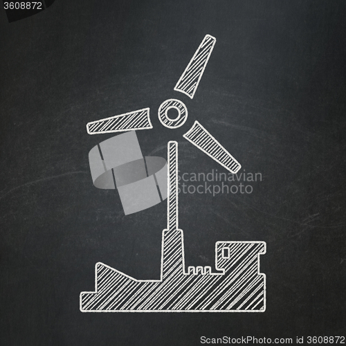 Image of Manufacuring concept: Windmill on chalkboard background