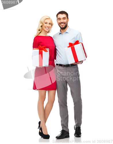 Image of happy couple with gift boxes