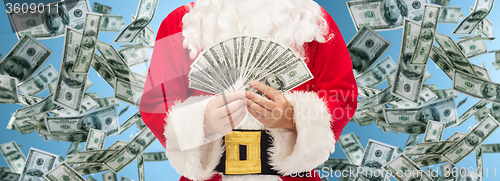 Image of close up of santa claus with dollar money