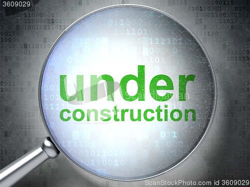 Image of SEO web development concept: Under Construction with optical glass