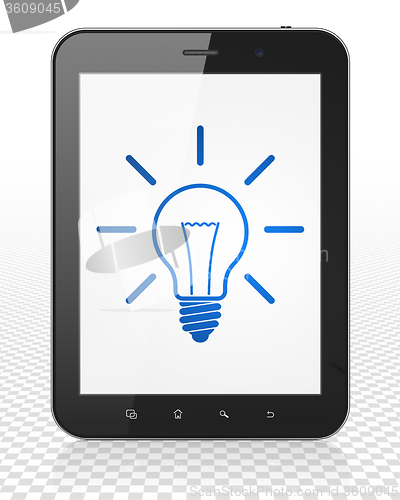 Image of Finance concept: Tablet Pc Computer with Light Bulb on display