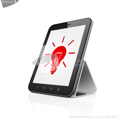 Image of Finance concept: Tablet Computer with Light Bulb on display