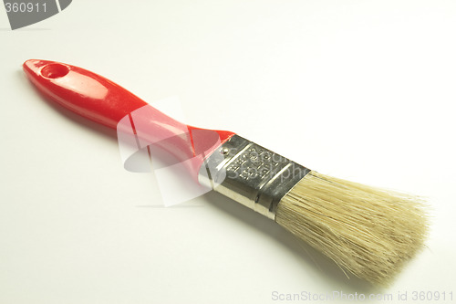 Image of red handled paint brush