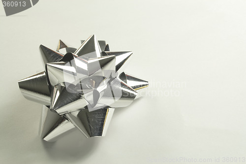 Image of silver foil bow