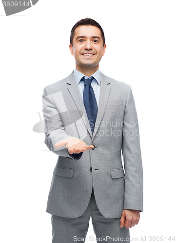 Image of happy smiling businessman in suit