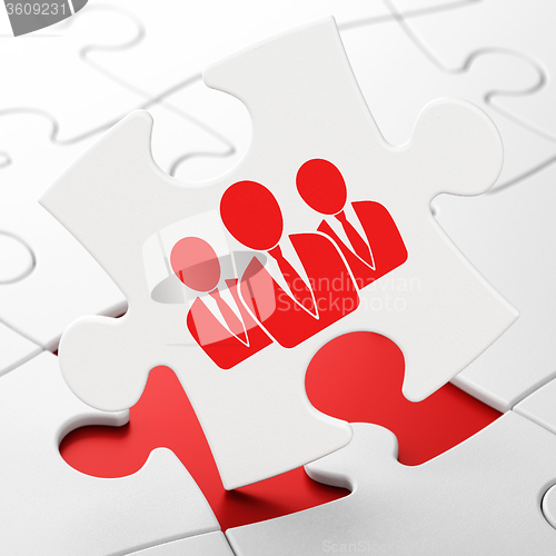 Image of Finance concept: Business People on puzzle background
