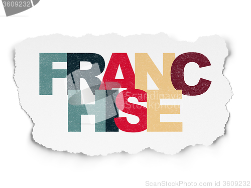 Image of Finance concept: Franchise on Torn Paper background