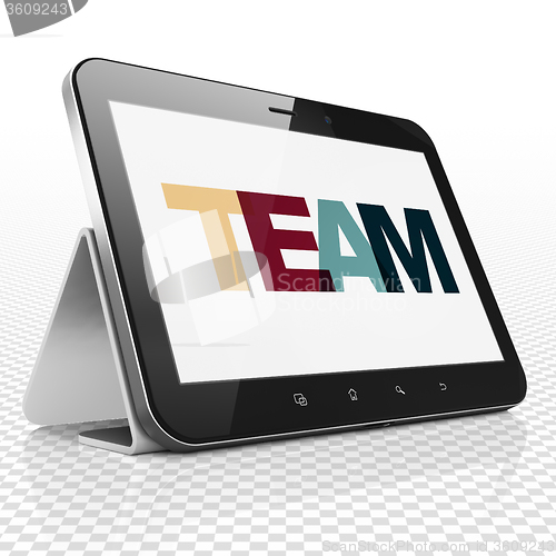 Image of Business concept: Tablet Computer with Team on  display