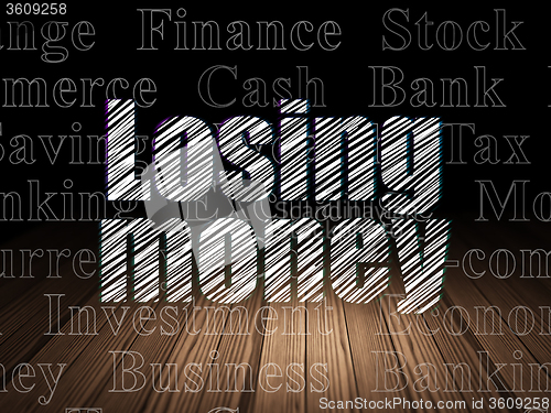 Image of Banking concept: Losing Money in grunge dark room
