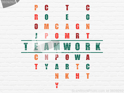 Image of Finance concept: Teamwork in Crossword Puzzle