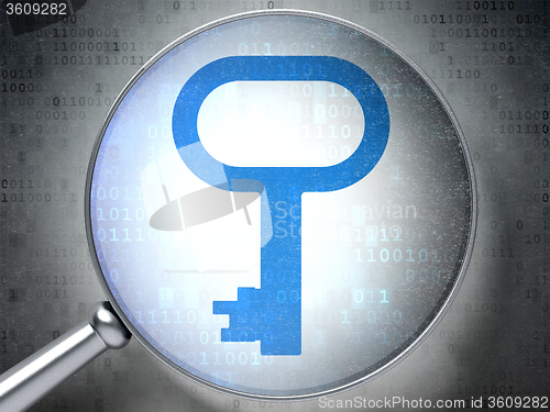 Image of Protection concept: Key with optical glass on digital background