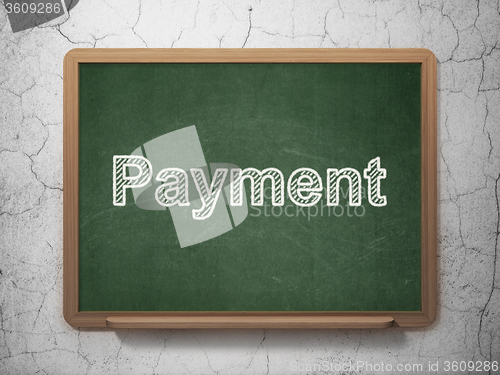 Image of Currency concept: Payment on chalkboard background