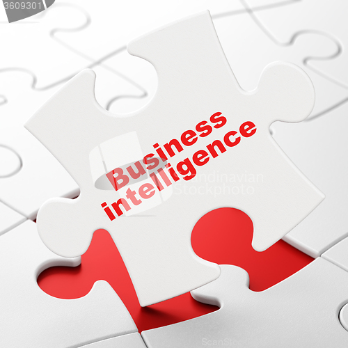 Image of Finance concept: Business Intelligence on puzzle background