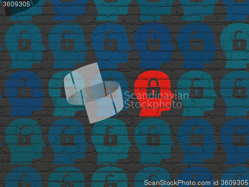 Image of Finance concept: head with padlock icon on wall background