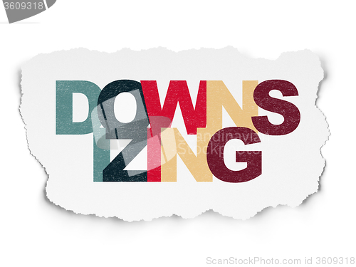 Image of Finance concept: Downsizing on Torn Paper background