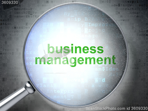Image of Finance concept: Business Management with optical glass