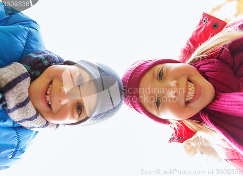 Image of happy boy and girl faces