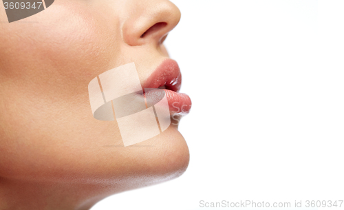 Image of close up of young woman lips